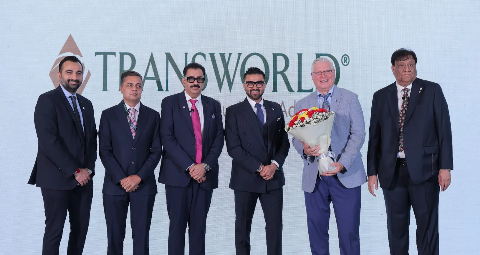 Launch of TBA India — Ray Titus, CEO of United Franchise Group, with the TBA India leadership team at the launch event